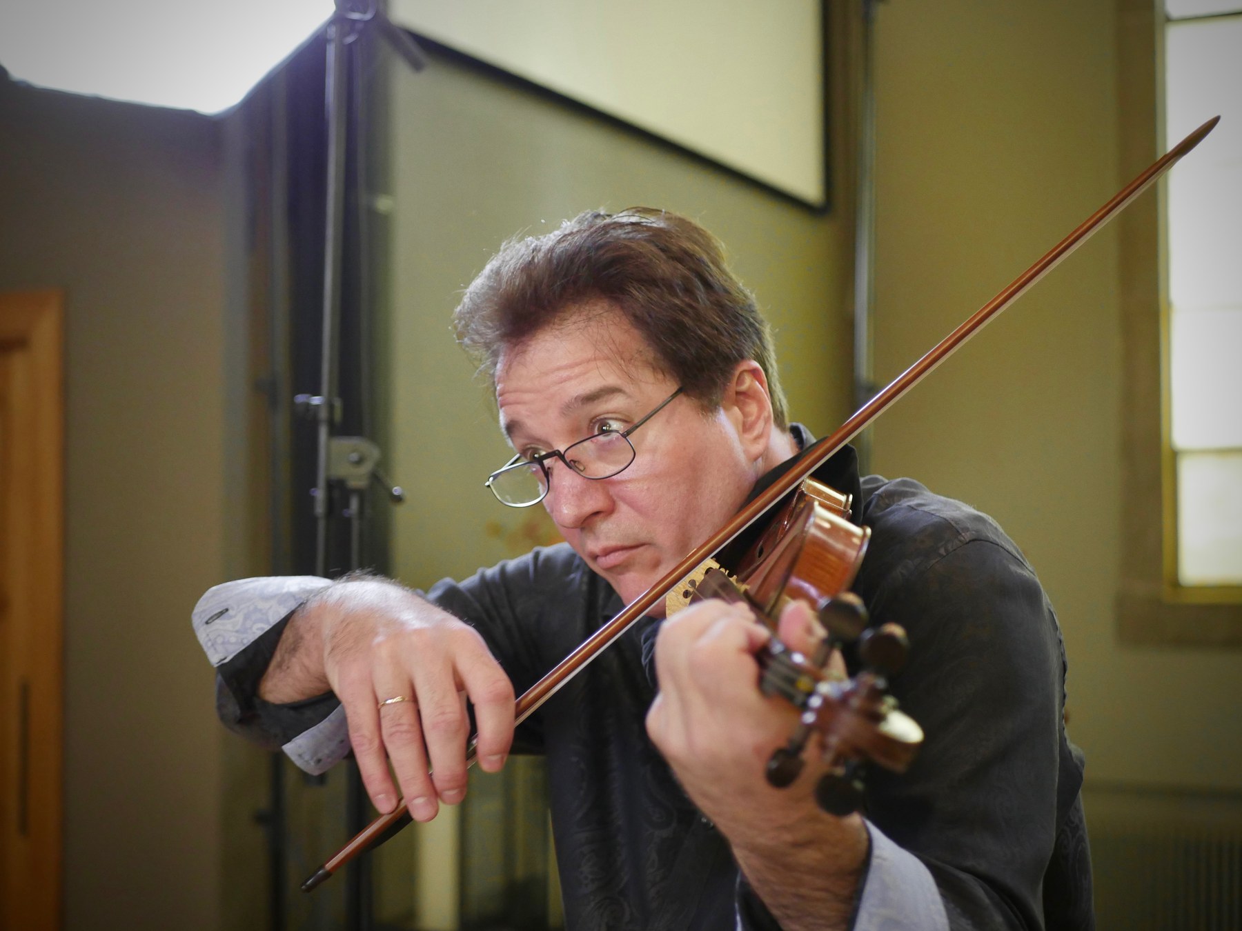 Music director and violinist Zachary Carrettin in the recording session